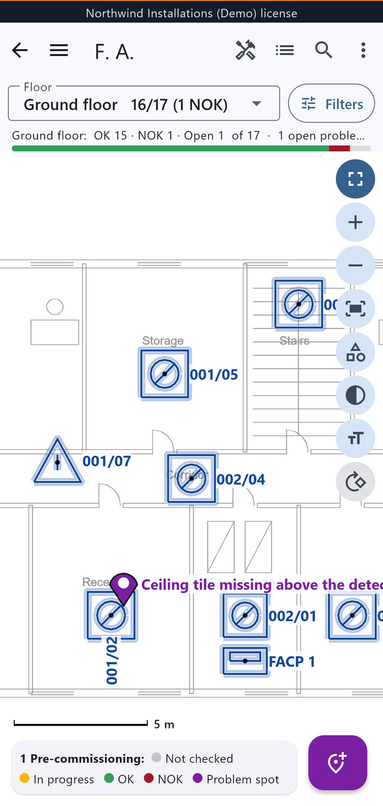 The same floor on a phone, zoomed in: detectors with their numbers and the problem spot at reception